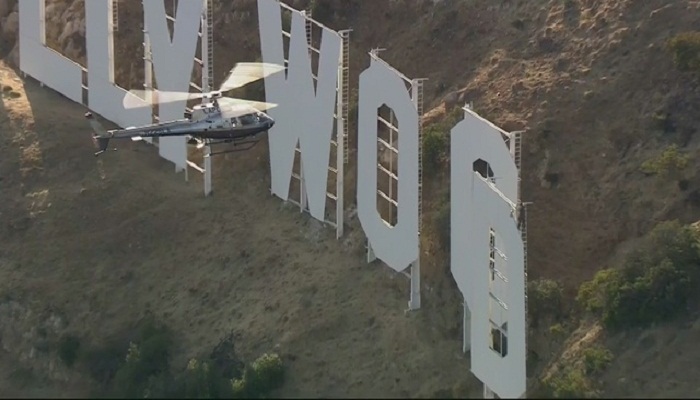YouTuber on Hollywood sign followed by helicopters-Netmarkers