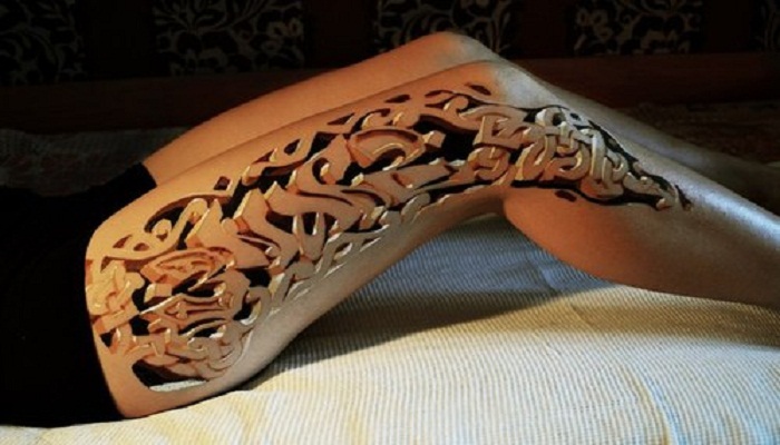 3d-tattoos-carved-wood-netmarkers
